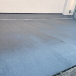 Epoxy garage floor and restored concrete driveway in a Sutherland Shire property